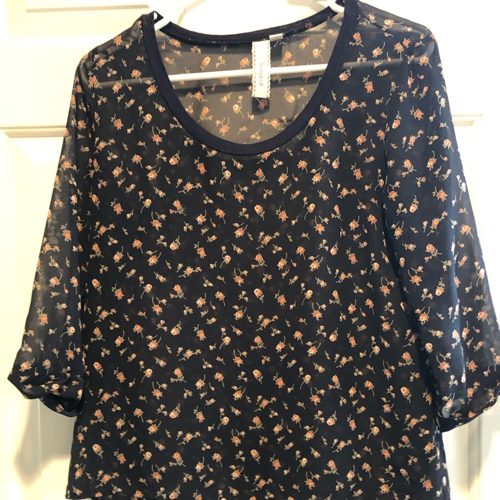 5 for $15. 💙 Sheer Blue Floral Blouse